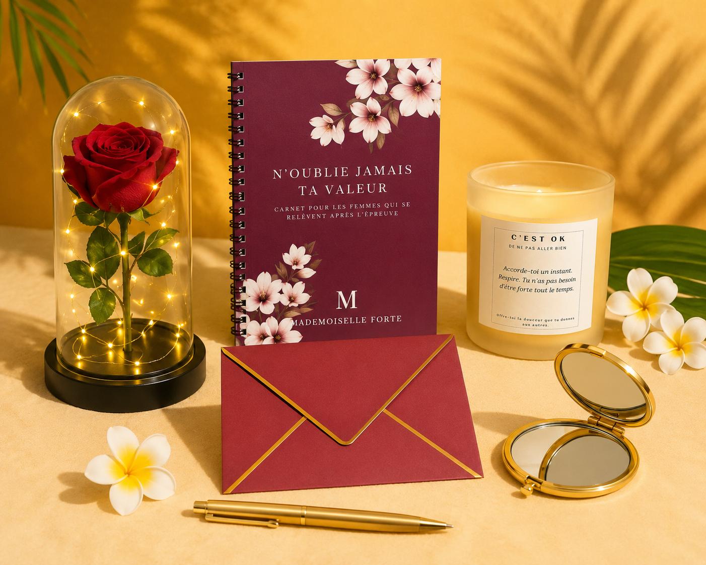 Box Reconstruction Mademoiselle Forte avec bougie artisanale parfum Monoï, carnet, miroir, rose éternelle et accessoires bien-être.